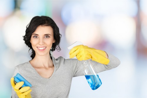 Technician using carpet cleaning equipment in Ruislip